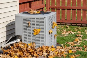 leaves-on-an-outdoor-AC-unit